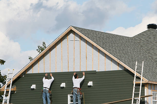 Professional Siding Replacement technician working in Bowie, TX